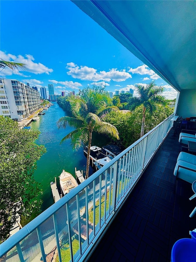 balcony featuring a water view