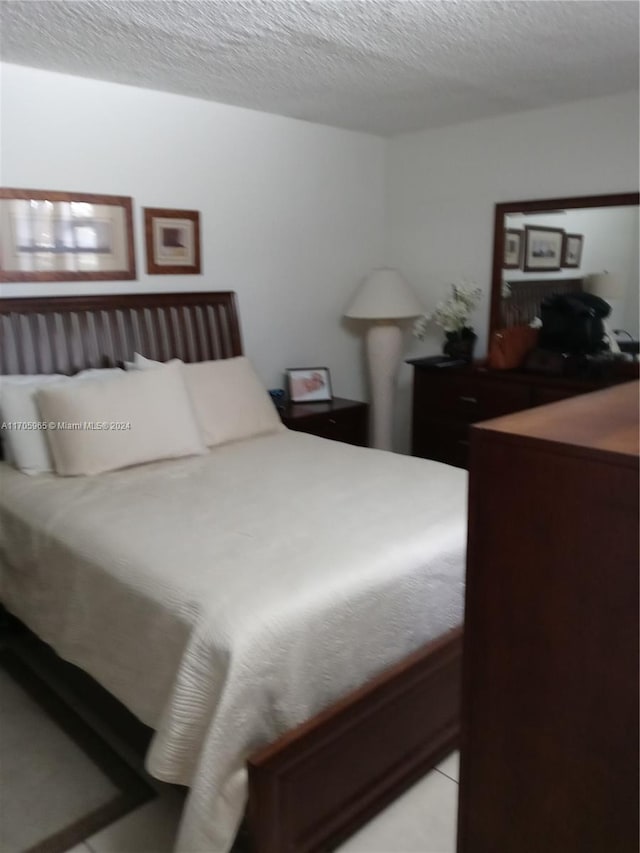 bedroom with a textured ceiling