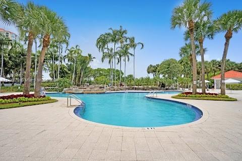 view of swimming pool with a patio