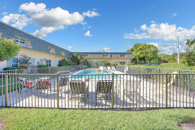 view of swimming pool featuring a patio