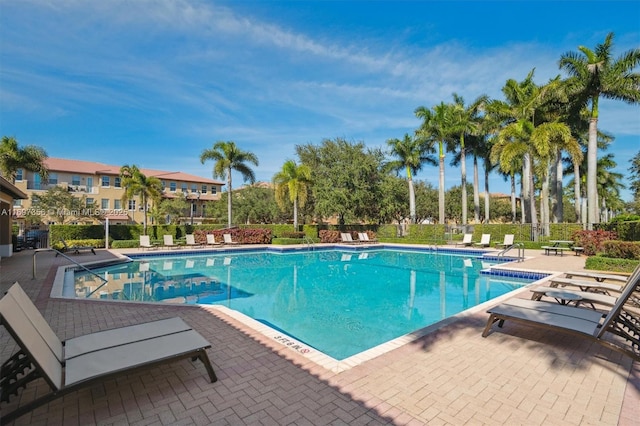 community pool with a patio