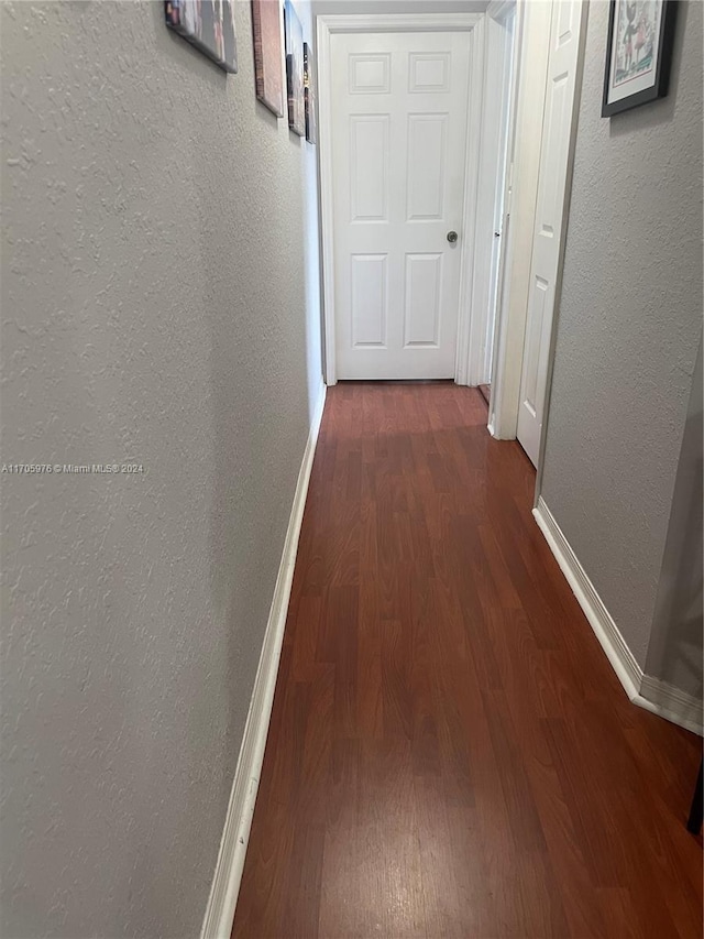 hall featuring dark hardwood / wood-style floors