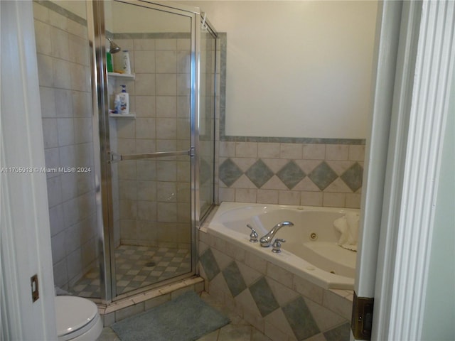 bathroom featuring tile patterned floors, toilet, and plus walk in shower