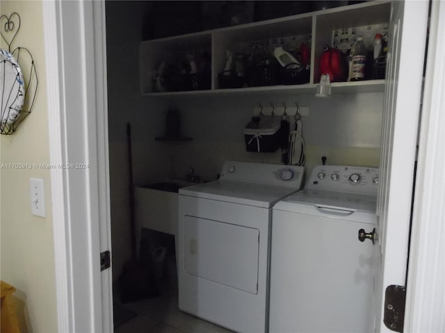 washroom featuring washer and dryer