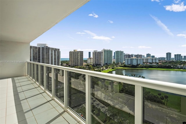 balcony featuring a water view