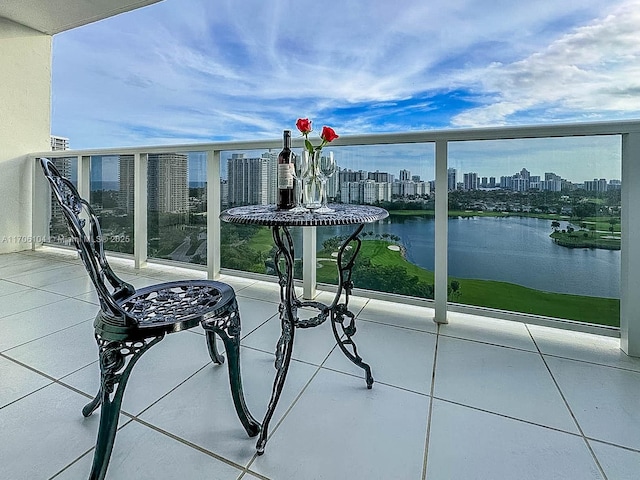 balcony featuring a water view