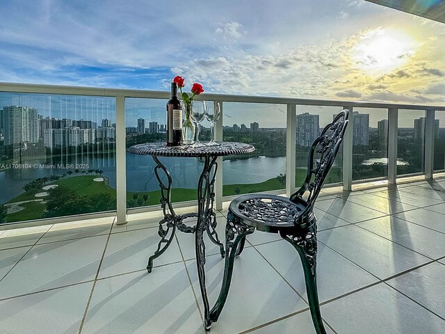 balcony featuring a water view