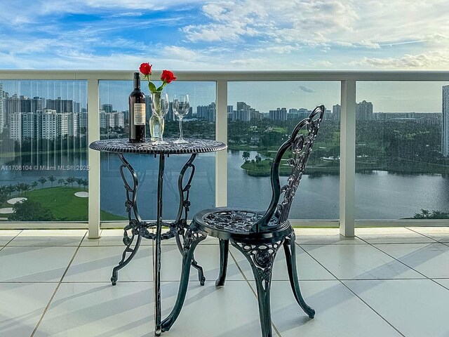 balcony featuring a water view