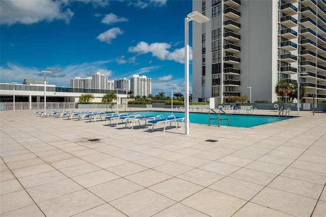 view of pool with a patio area