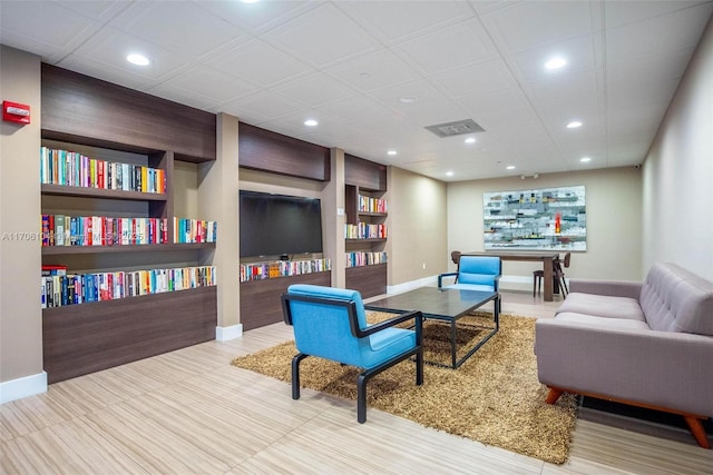 living room featuring built in shelves