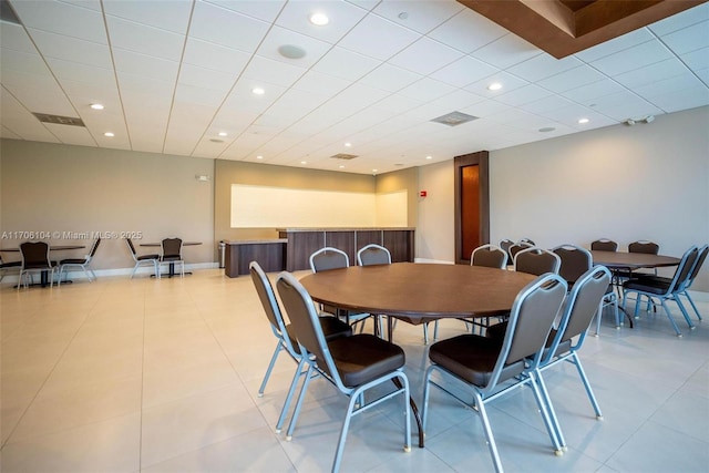 dining space with light tile patterned floors