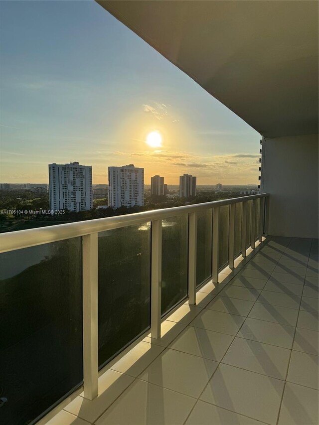 view of balcony at dusk