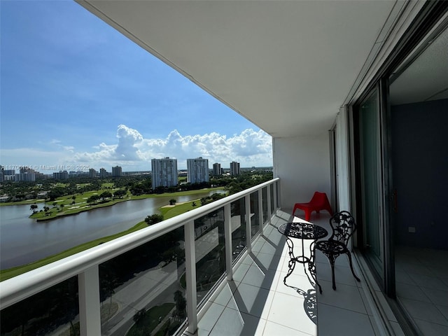 balcony featuring a water view