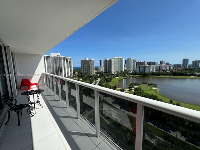 balcony featuring a water view