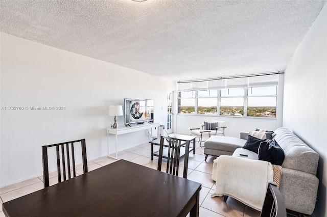 tiled living room with a textured ceiling