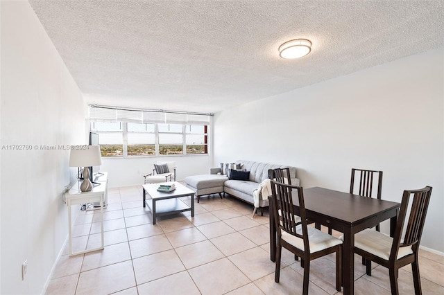 tiled living room with a textured ceiling