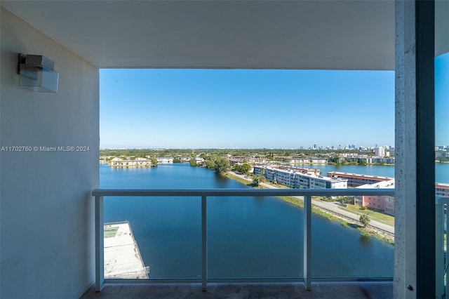 balcony featuring a water view