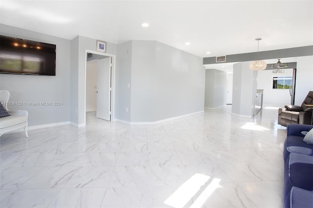 1400 SW 131st Way Unit 401Q, Pembroke Pines, FL 33027 - living area with recessed lighting, a chandelier, and light marble finish flooring