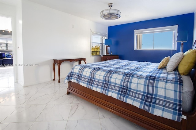 1400 SW 131st Way Unit 401Q, Pembroke Pines, FL 33027 - bedroom featuring marble finish floors and baseboards