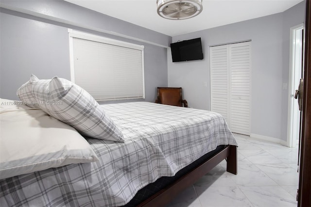 1400 SW 131st Way Unit 401Q, Pembroke Pines, FL 33027 - bedroom with marble finish flooring and a closet