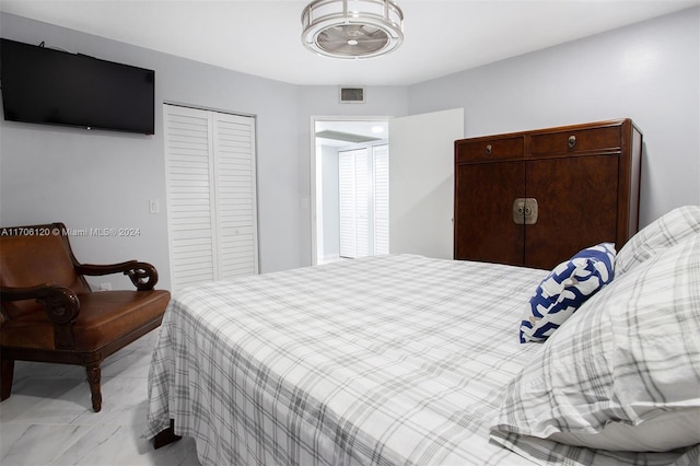 1400 SW 131st Way Unit 401Q, Pembroke Pines, FL 33027 - bedroom featuring light marble finish floors and a closet