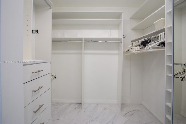 1400 SW 131st Way Unit 401Q, Pembroke Pines, FL 33027 - walk in closet featuring marble look tiles