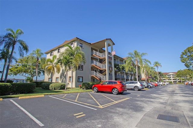 1400 SW 131st Way Unit 401Q, Pembroke Pines, FL 33027 - view of apartment building / complex featuring uncovered parking