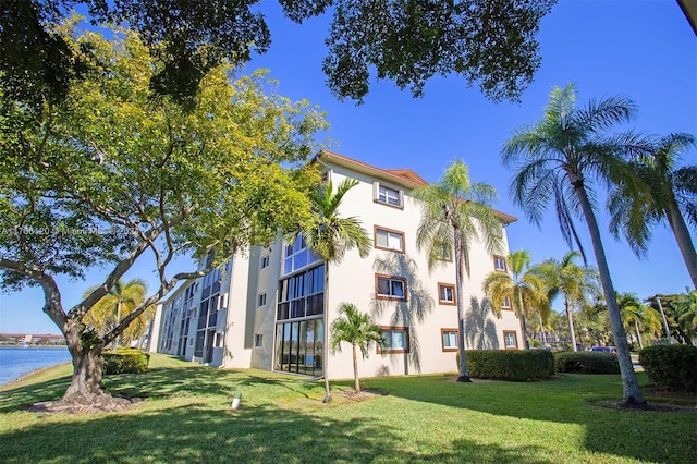 view of property with a water view