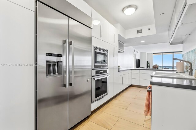 bar featuring white cabinetry