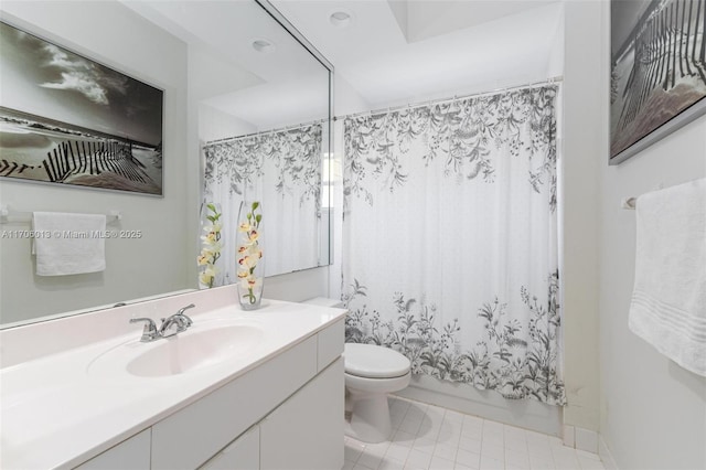 full bathroom featuring toilet, vanity, and shower / bathtub combination with curtain