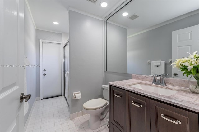 bathroom featuring a shower with door, toilet, vanity, and ornamental molding