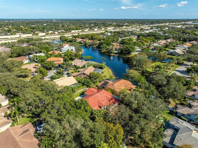 drone / aerial view featuring a water view