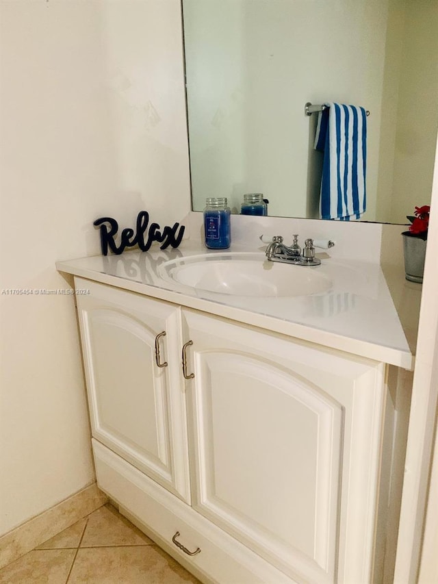 bathroom with vanity and tile patterned floors