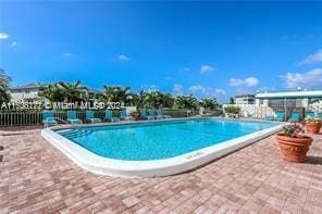 view of pool featuring a patio