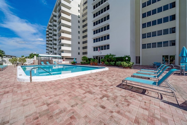 view of pool featuring a patio