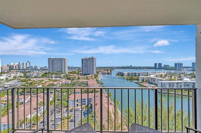 balcony featuring a water view