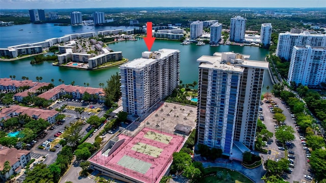 birds eye view of property featuring a water view