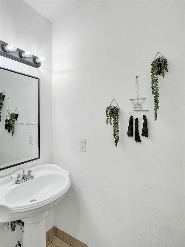 bathroom featuring tile patterned floors and sink