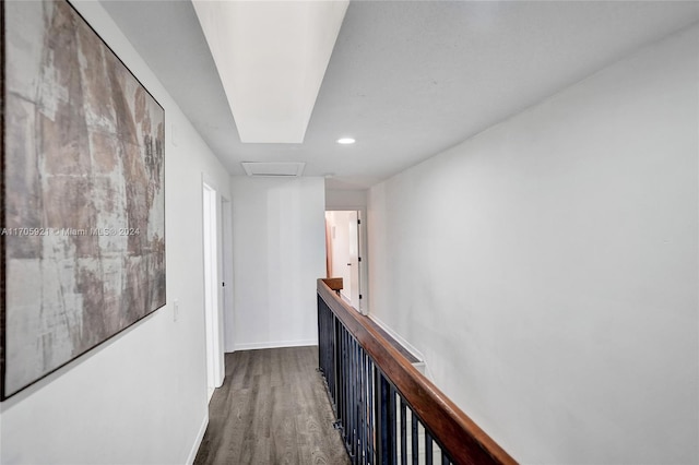 corridor featuring dark hardwood / wood-style flooring