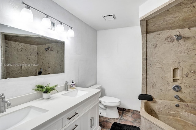 full bathroom with shower / tub combination, vanity, and toilet