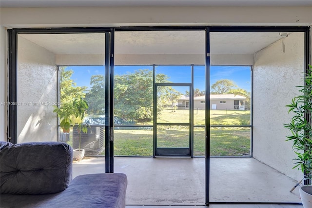 doorway featuring concrete flooring