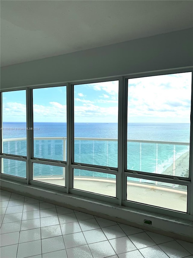 interior space featuring a healthy amount of sunlight and a water view