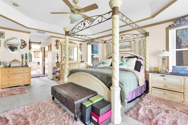 carpeted bedroom featuring ceiling fan and crown molding