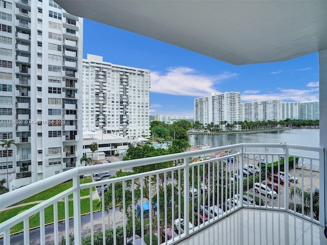 balcony featuring a water view