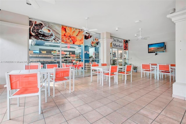 dining room with tile patterned flooring and ceiling fan