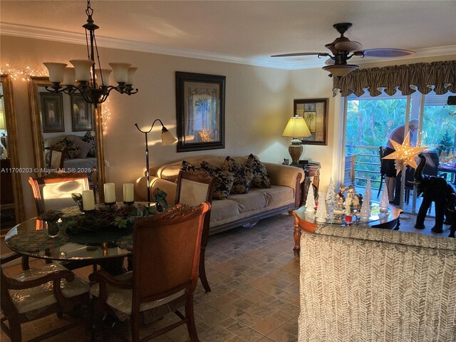 dining area with ceiling fan with notable chandelier and ornamental molding