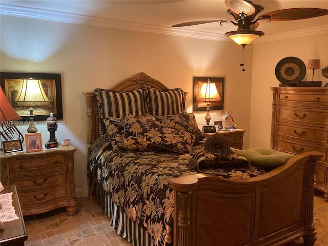 bedroom with ceiling fan and ornamental molding