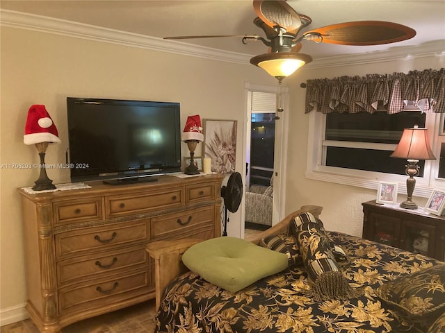 bedroom featuring ceiling fan and ornamental molding