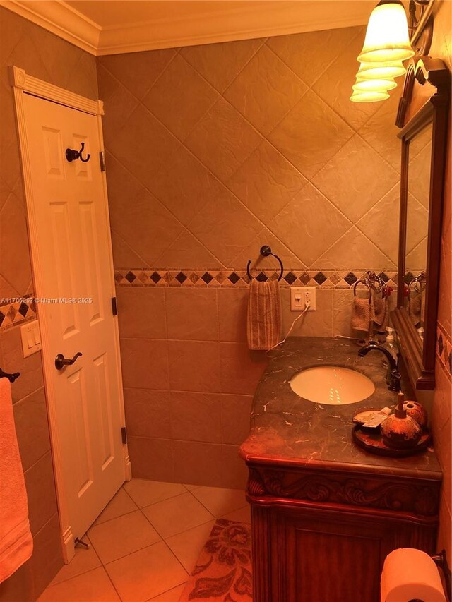 bathroom with tile patterned flooring, toilet, and tile walls