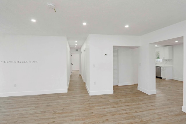 unfurnished room featuring light hardwood / wood-style floors